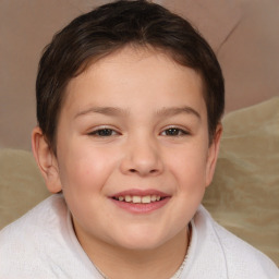 Joyful white child female with short  brown hair and brown eyes