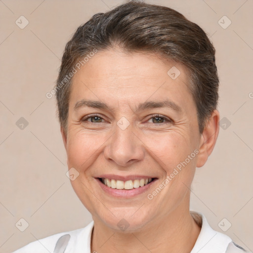 Joyful white adult female with short  brown hair and brown eyes