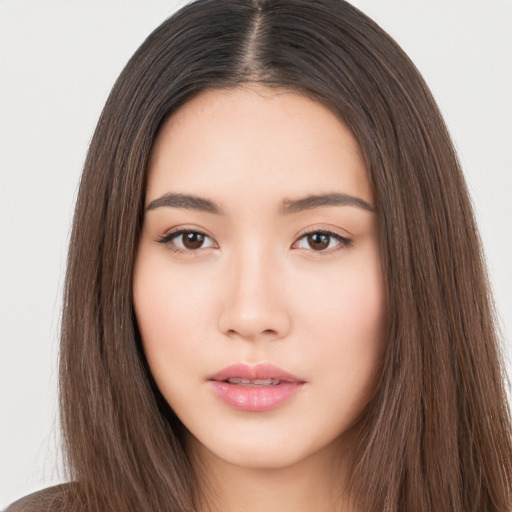 Neutral asian young-adult female with long  brown hair and brown eyes