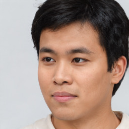 Neutral asian young-adult male with short  black hair and brown eyes