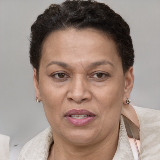 Joyful white adult female with short  brown hair and brown eyes