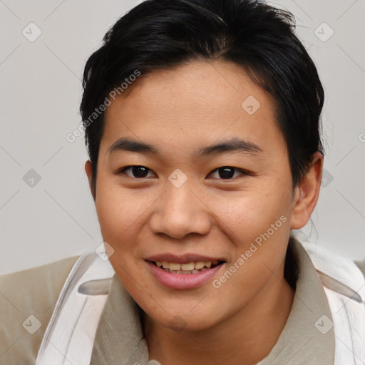 Joyful asian young-adult female with short  brown hair and brown eyes