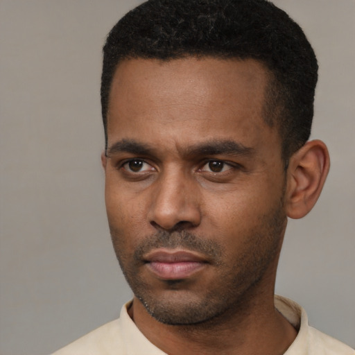 Neutral latino young-adult male with short  black hair and brown eyes