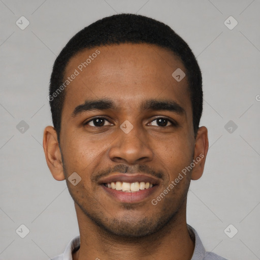 Joyful black young-adult male with short  black hair and brown eyes