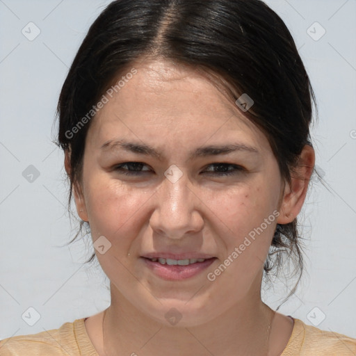 Joyful white adult female with medium  brown hair and brown eyes