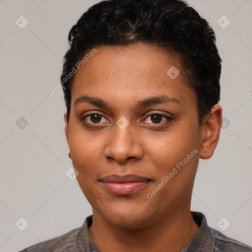 Joyful latino young-adult female with short  black hair and brown eyes