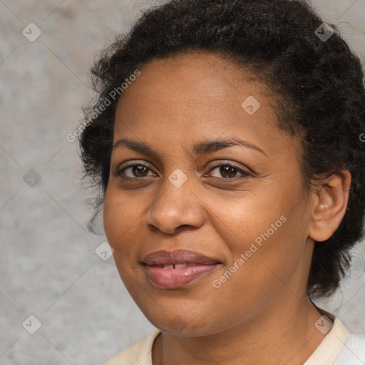 Joyful black young-adult female with medium  brown hair and brown eyes