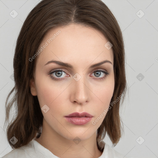 Neutral white young-adult female with medium  brown hair and grey eyes