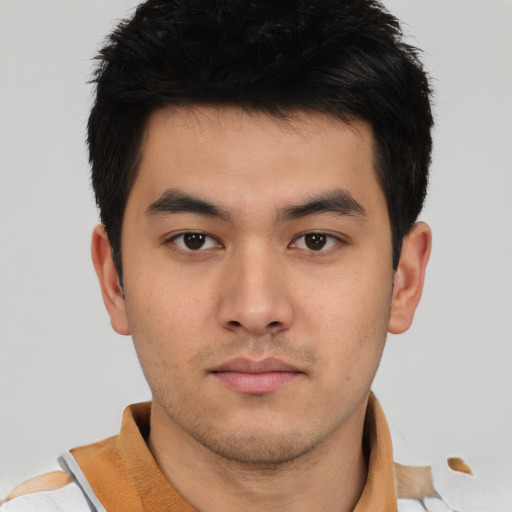 Neutral asian young-adult male with short  brown hair and brown eyes
