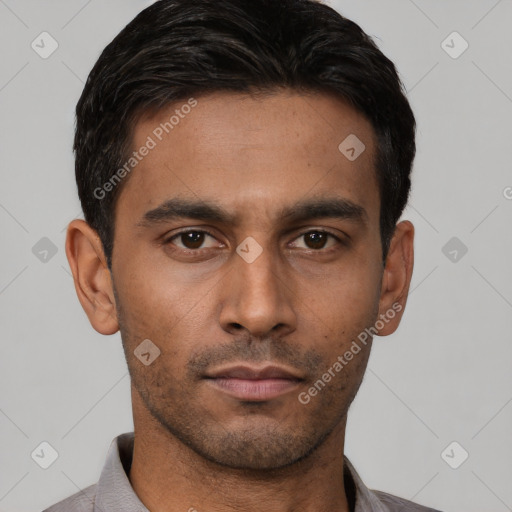Neutral latino young-adult male with short  brown hair and brown eyes