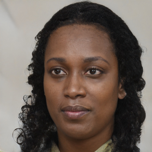 Neutral black young-adult female with long  black hair and brown eyes