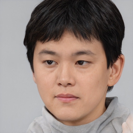 Neutral asian young-adult male with short  brown hair and brown eyes