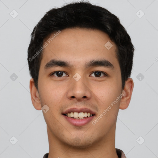 Joyful asian young-adult male with short  brown hair and brown eyes