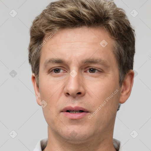 Neutral white adult male with short  brown hair and brown eyes