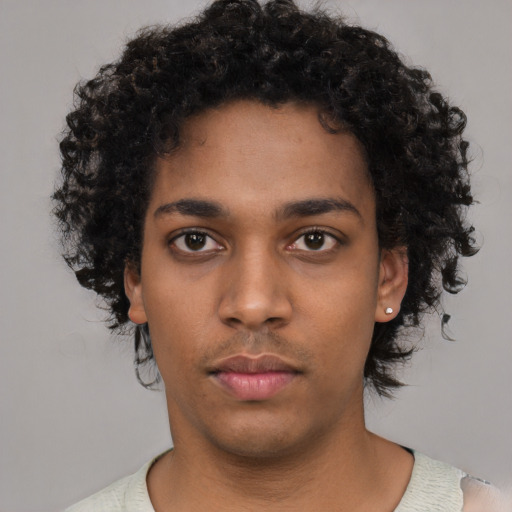 Neutral black young-adult female with short  black hair and brown eyes