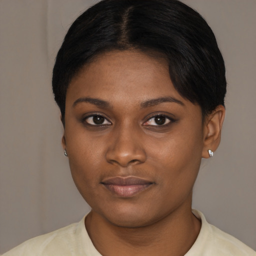 Joyful asian young-adult female with short  brown hair and brown eyes