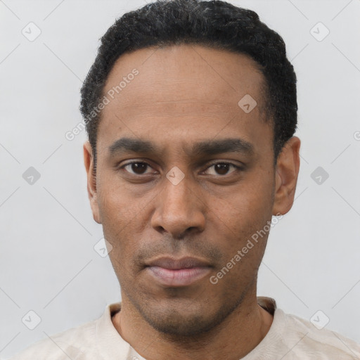 Neutral latino young-adult male with short  black hair and brown eyes