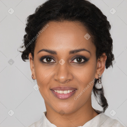 Joyful black young-adult female with medium  black hair and brown eyes