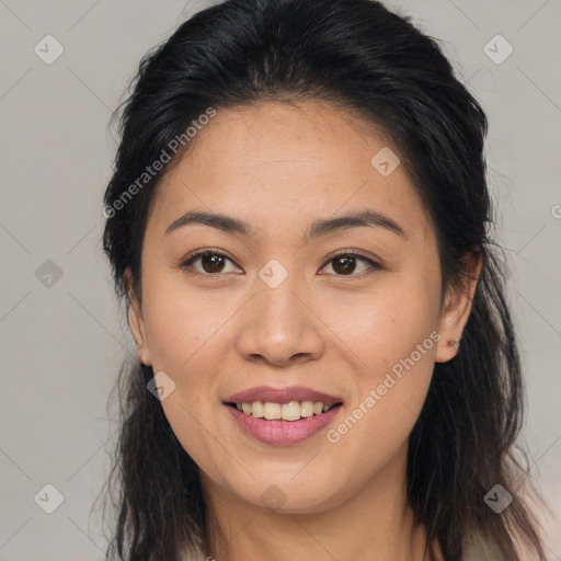 Joyful white young-adult female with long  brown hair and brown eyes