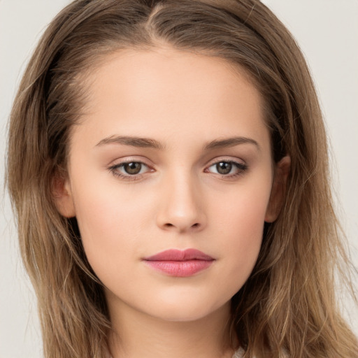 Neutral white young-adult female with long  brown hair and brown eyes