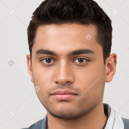 Neutral white young-adult male with short  brown hair and brown eyes