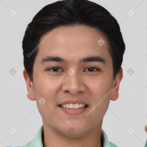 Joyful white young-adult male with short  black hair and brown eyes