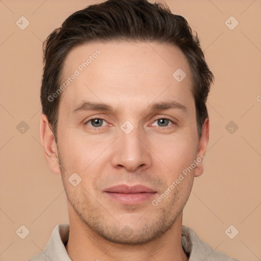 Joyful white young-adult male with short  brown hair and brown eyes