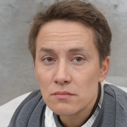 Neutral white adult male with short  brown hair and brown eyes