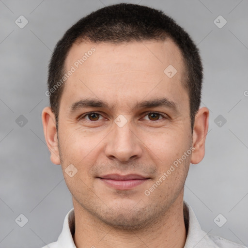 Joyful white young-adult male with short  brown hair and brown eyes