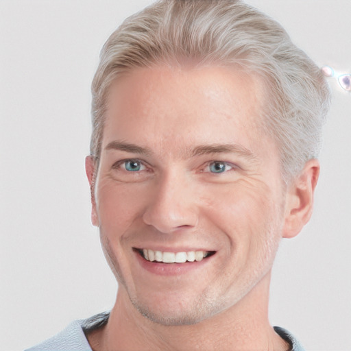 Joyful white adult male with short  brown hair and grey eyes