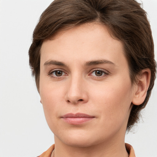 Neutral white young-adult female with short  brown hair and brown eyes