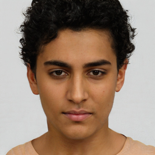 Neutral latino young-adult male with short  brown hair and brown eyes