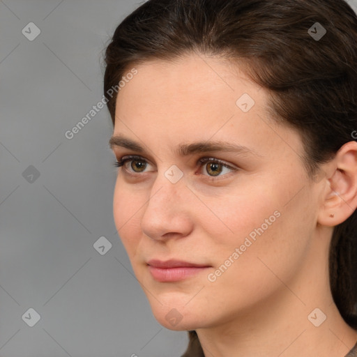 Neutral white young-adult female with short  brown hair and brown eyes