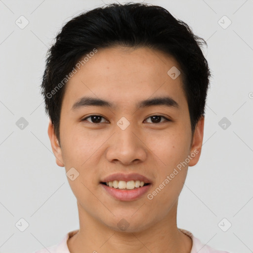 Joyful asian young-adult male with short  black hair and brown eyes