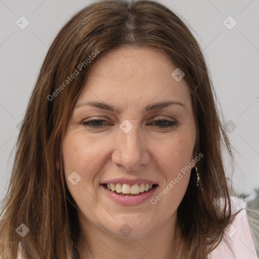 Joyful white adult female with long  brown hair and brown eyes