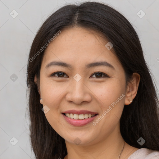 Joyful white young-adult female with long  brown hair and brown eyes