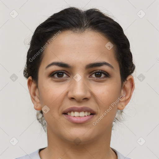 Joyful latino young-adult female with short  brown hair and brown eyes