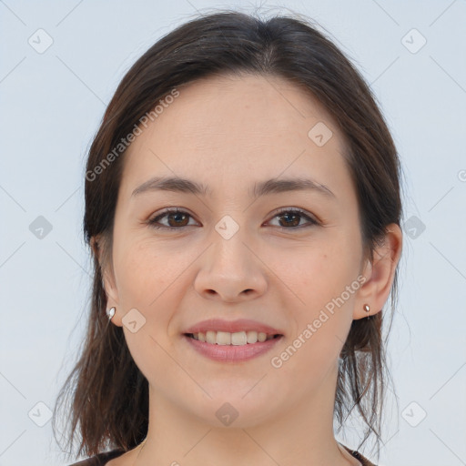 Joyful white young-adult female with medium  brown hair and brown eyes