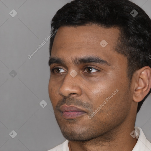 Neutral latino young-adult male with short  black hair and brown eyes