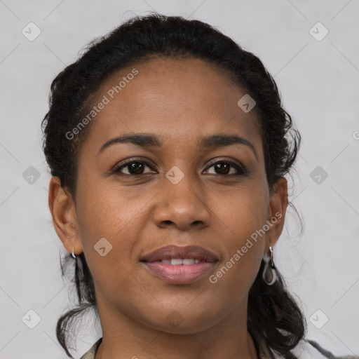 Joyful black young-adult female with medium  brown hair and brown eyes