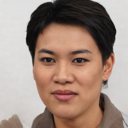 Joyful asian young-adult female with short  black hair and brown eyes