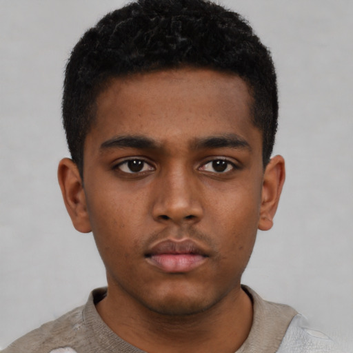 Neutral black young-adult male with short  black hair and brown eyes