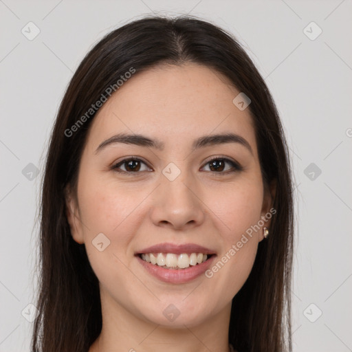 Joyful white young-adult female with long  brown hair and brown eyes