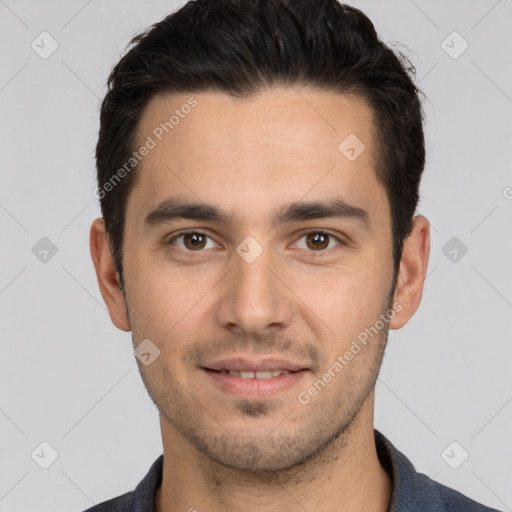 Joyful white young-adult male with short  black hair and brown eyes