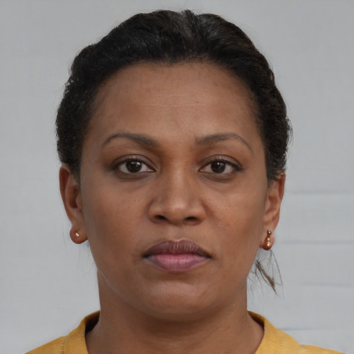 Neutral black young-adult female with short  brown hair and brown eyes