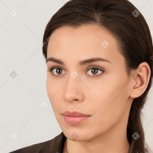 Neutral white young-adult female with long  brown hair and brown eyes