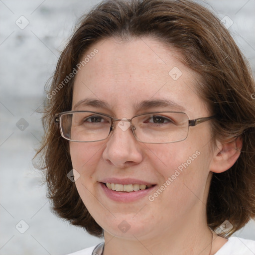 Joyful white adult female with medium  brown hair and grey eyes