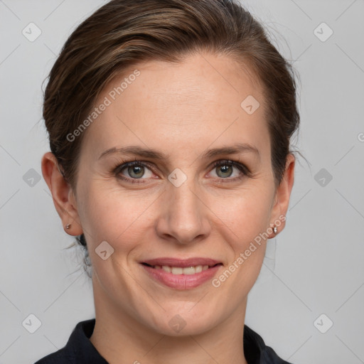 Joyful white adult female with medium  brown hair and grey eyes