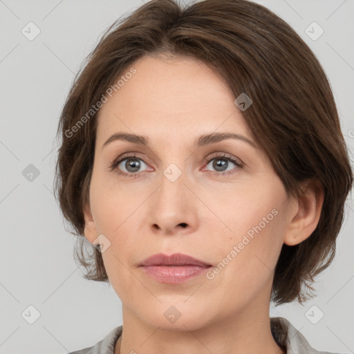 Neutral white young-adult female with medium  brown hair and grey eyes