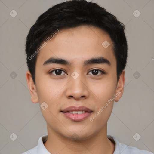 Joyful asian young-adult male with short  black hair and brown eyes